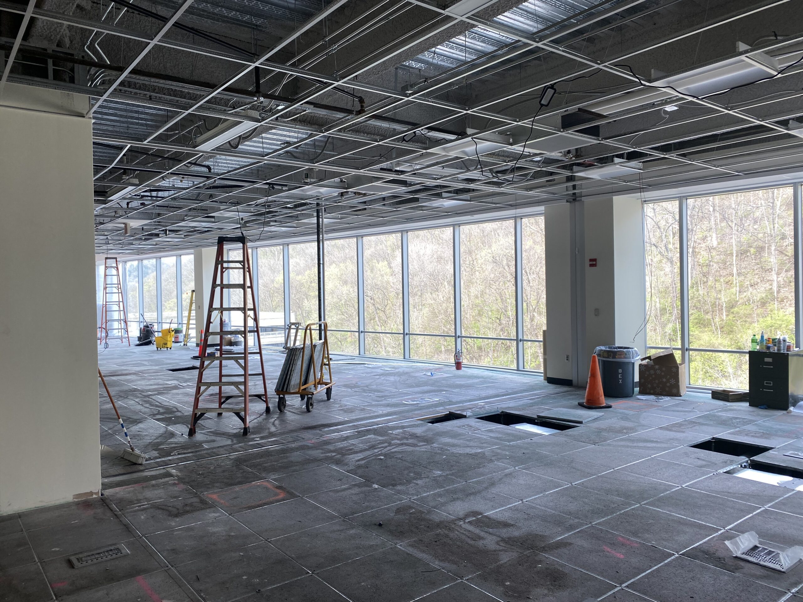 Commercial electrical rough-in and lighting installation during office buildout in Lexington, KY