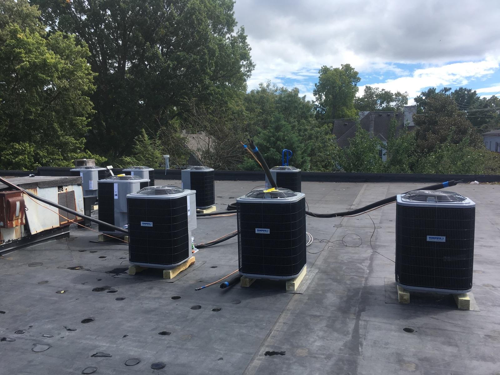 Multiple commercial HVAC rooftop units installed by Lexington Electrical & HVAC in Central Kentucky
